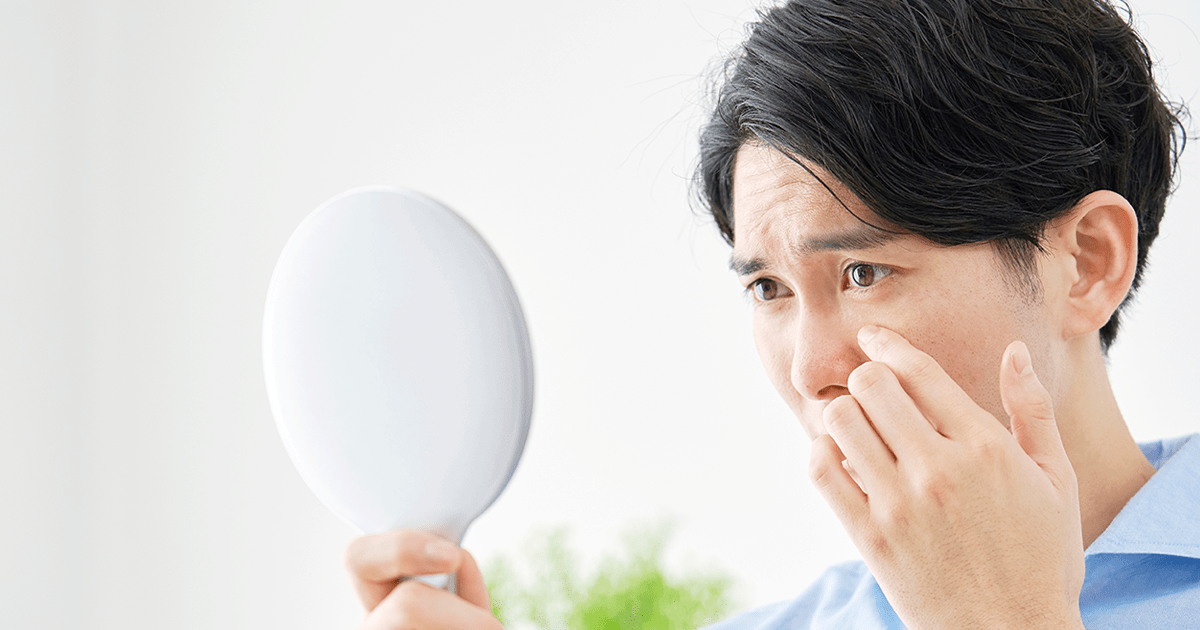 手のけいれんの原因は何ですか?